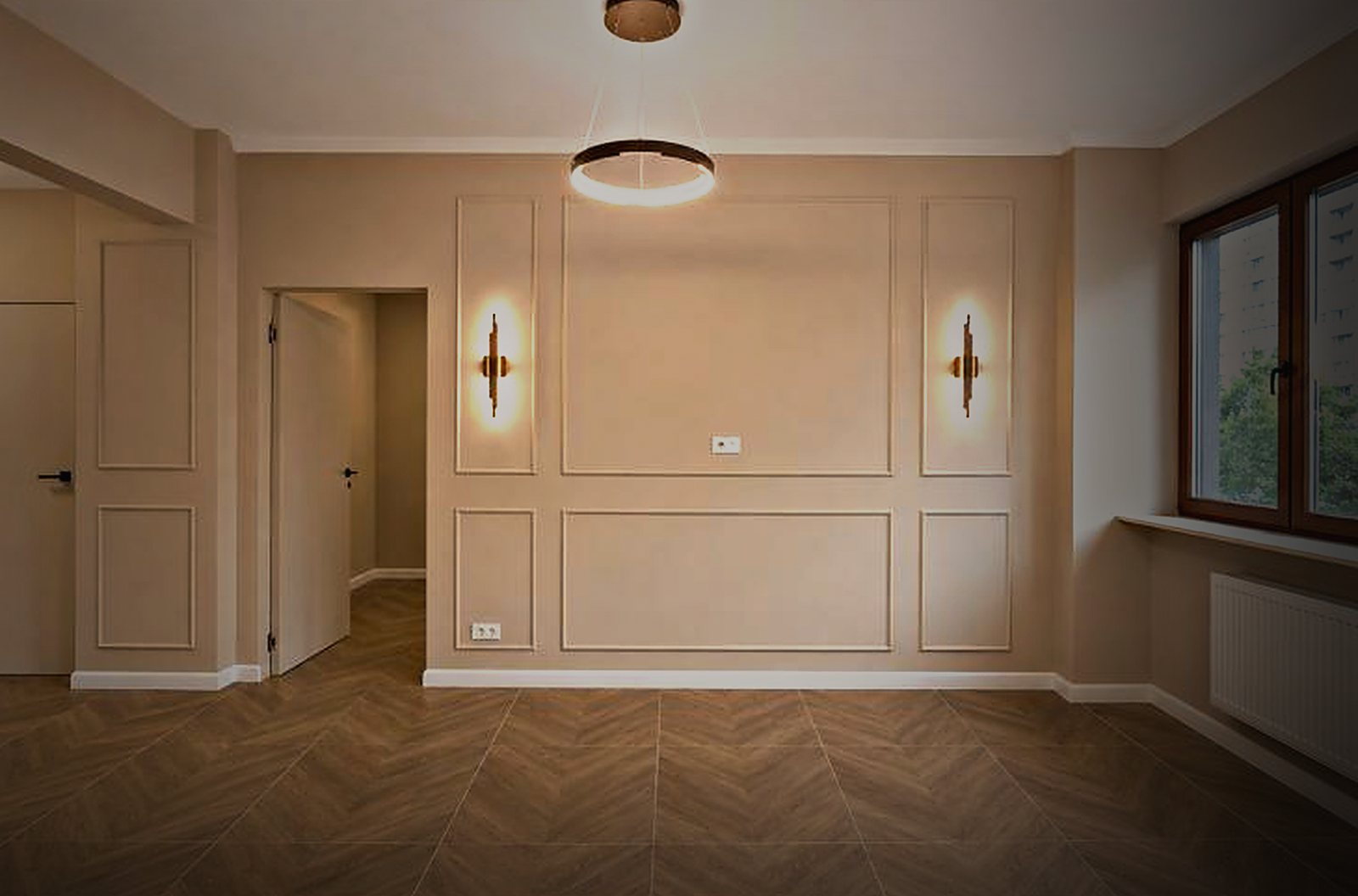 Același living după renovare: boiserie, parchet în spic, iluminat ambiental și pendul inelar.